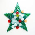Star shape made of multicolored plastic on a white background