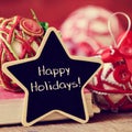 Star-shaped chalkboard with the text happy holidays Royalty Free Stock Photo