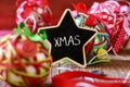 Star-shaped chalkboard with the text xmas Royalty Free Stock Photo