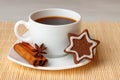 Star shaped chocolate chip cookies with anise and cinnamon with a cup of tea Royalty Free Stock Photo