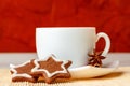 Star shaped chocolate chip cookies with anise with a cup of tea Royalty Free Stock Photo