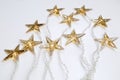 Star shaped Christmas lights against white background with copy space Royalty Free Stock Photo