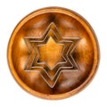 Star shaped cookie cutters, hexagram shaped biscuit cutters, in a wooden bowl