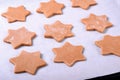 Star shaped dough for gingerbread shortbread cookies Royalty Free Stock Photo