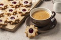 Star shaped linzer cookies with raspberry jam Royalty Free Stock Photo