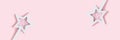 Star shaped magic wand with sequins on a pink pastel background Royalty Free Stock Photo