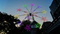 Star shaped neon windmill in a festival