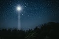 A The star shines over the manger of christmas of Jesus Christ