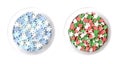 Snowflake and star shaped confetti sprinkles, confetti candy in white bowls Royalty Free Stock Photo