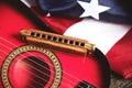 Star spangled banner, guitar and harmonica. Musical instrument and flag of the United States of America