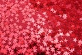 Star sprinkles on red. Royalty Free Stock Photo