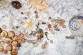 Star, stones and shells lying on a marble background, composition of sea stones and seashells, marine composition, Royalty Free Stock Photo