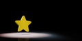 Star Symbol Spotlighted on Black Background Royalty Free Stock Photo