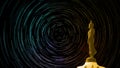 Star trail on sky back Buddha looking seven day style standing status Royalty Free Stock Photo