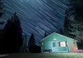 Star trails above Apatisan mountain hut Royalty Free Stock Photo