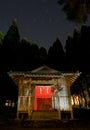 Star trails above a rural Japanese shrine Royalty Free Stock Photo