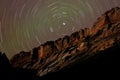 Star Trails around Polaris above Desert Cliffs Royalty Free Stock Photo