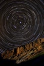 Star Trails around Polaris above a Sandstone Cliff Royalty Free Stock Photo