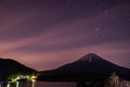 Star trails and Mount Fuji at twilight, the World Heritage Royalty Free Stock Photo