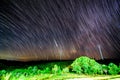 Star trails on the skyt at wind turbine park view Royalty Free Stock Photo