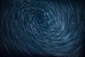 Star trails with the swirl vortex effect seen at night in Romania - Perseid meteor shower 2019 Royalty Free Stock Photo