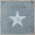 star at the walk of stars at trinity street in Austin Texas. They honor famous people in the wild west cowboy history