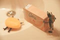 Star Wars concept shot of a Boba Fett getting Han Solo again with a bar of soap Royalty Free Stock Photo