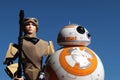 Star Wars LEGO figure of Rey Skywalker in desert outfit with Sphero BB-8 droid from Star Wars movies.