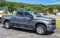 Starbrick, Pennsylvania, USA August 14, 2022 A used, gray four door Chevrolet truck for sale at a dealership