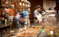 A Starbucks barista making coffee for their customer at the Starbucks Reserve Roastery in Shanghai