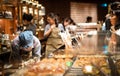 A Starbucks barista making coffee for their customer at the Starbucks Reserve Roastery in Shanghai