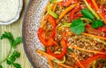 Starch rice, potato noodles with vegetables - bell peppers, carrots, cucumber, sesame seeds, cilantro and soy sauce Royalty Free Stock Photo