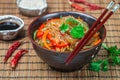 Starch rice, potato noodles with vegetables - bell peppers, carrots, cucumber, sesame seeds, cilantro and soy sauce