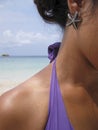 Starfish earing woman on beach Royalty Free Stock Photo
