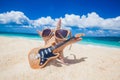 Starfish guitar player on beach Royalty Free Stock Photo