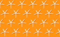 Starfish pattern on orange background. Summer background. Decorative textile seamless pattern. Isolated object.