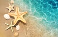 Starfish and seashell on the summer beach in sea water. Summer background. Royalty Free Stock Photo