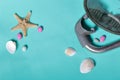 Starfish, shells and colored pebbles. Mask with a snorkel for scuba diving. They lie on a rough linen fabric Royalty Free Stock Photo