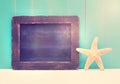 Starfish and small chalkboard