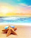 Starfish in sunglasses on the summer beach