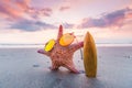 Starfish surfer on beach Royalty Free Stock Photo