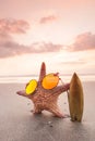 Starfish surfer on the beach Royalty Free Stock Photo