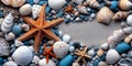 A starfish surrounded by shells and pebbles on a sandy beach Royalty Free Stock Photo