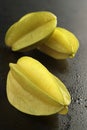 Starfruit on black background