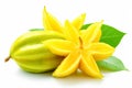 Starfruit, carambola with green leaves isolated on white background.