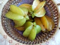 Starfruits in a wicker basket Royalty Free Stock Photo