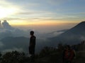 staring at the beauty of the tapestry of clouds above the top of Mount Gede Indonesia