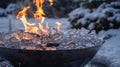 A stark yet alluring sight the frozen stillness of the ice bath and the fiery activity of the fire pit create a