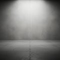 Empty studio spotlight with textured walls and floor creating dramatic lighting effects Royalty Free Stock Photo
