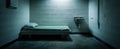 The stark prison cell featuring a minimalist bed and sink for solitary confinement..AI generated image Royalty Free Stock Photo